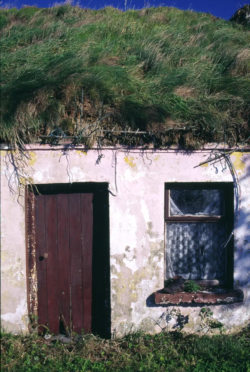 A grass roofed house on the west coast of Ireland.