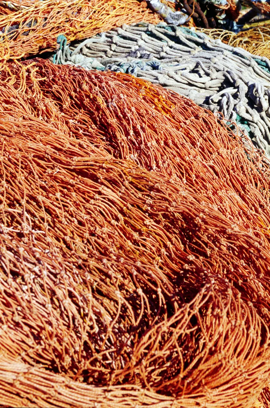 A fisherman's net piled alongside a country road on Inishmore Island, County Galway.