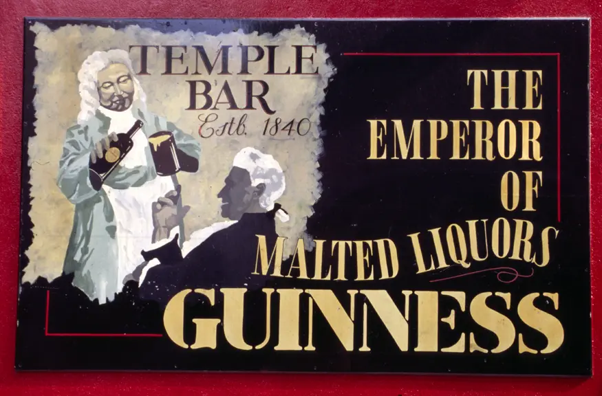 A Guinness advertisement adorns one of the many pubs in the lively Temple Bar area of Dublin.