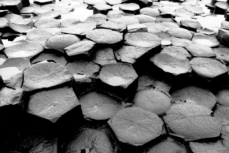 The unusual rock formations of the Giant's Causeway in Northern Ireland, a mass of 40,000 basalt columns caused by cooling lava.
