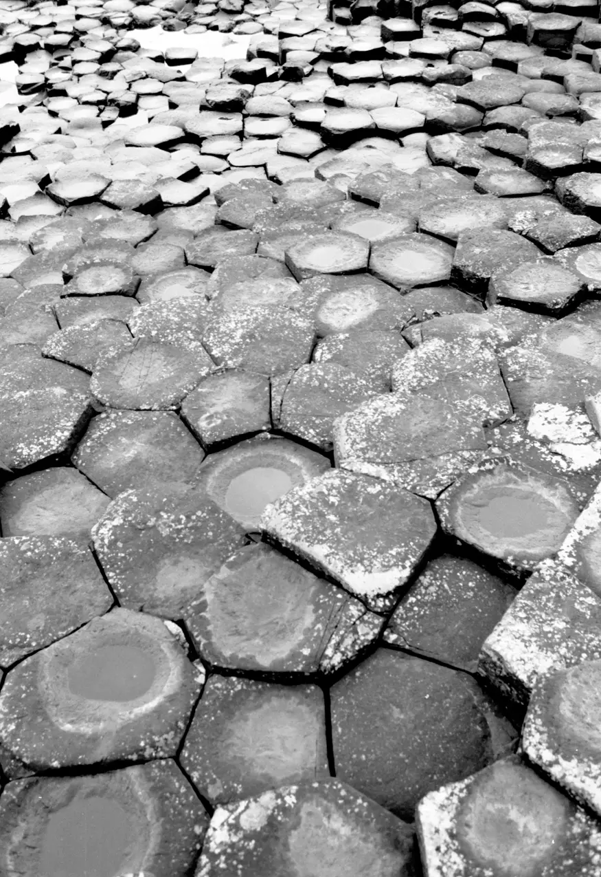 The unusual rock formations of the Giant's Causeway in Northern Ireland, a mass of 40,000 basalt columns caused by cooling lava.