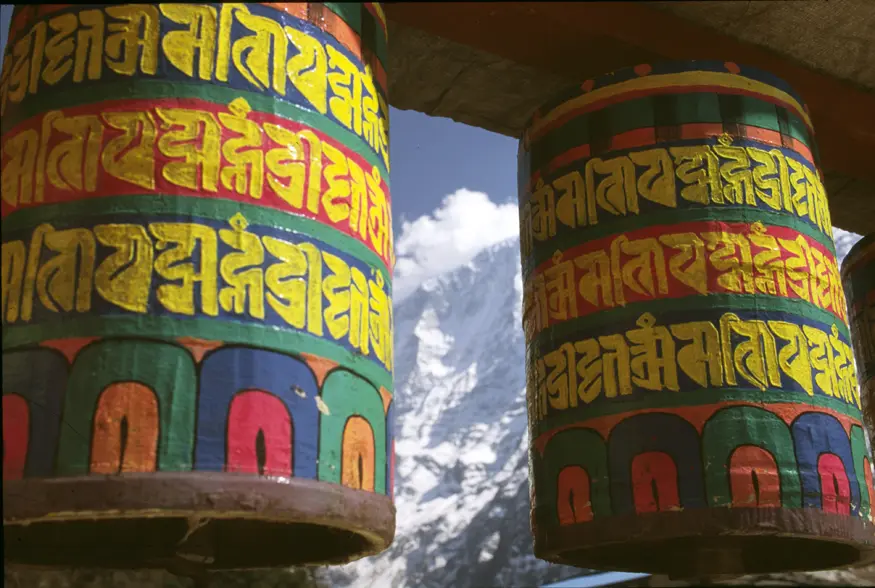 When turned clockwise, prayer wheels, like this one at the Tengboche Monastery, are thought by Buddhists to release blessings of compassion.