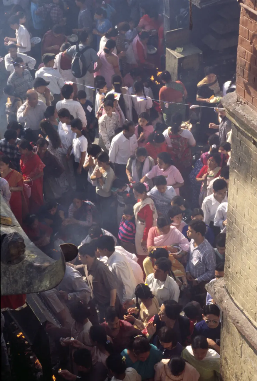 Crowds and incense smoke circle the stupa at Kathmandu's Monkey Temple (Swayambhunath) during Buddha Jayanti, the celebration of Buddha's birthday 2545 years ago.