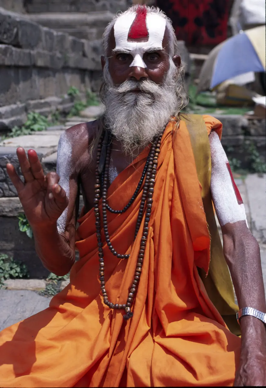 A sadhu, or Hindu holy man, poses for a photograph in Kathmandu's Durbar Square.
