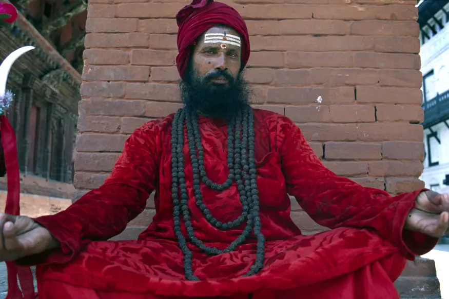 Sadhus are Hindu holy men who live beggar-like existences in their search for enlightenment. This one lives a profitable existence in Kathmandu, charging tourists for photographs.