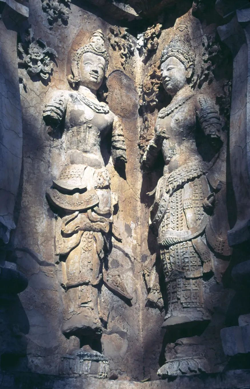 Reliefs carved on the outside of the Buddhist temple Wat Jet Yot.