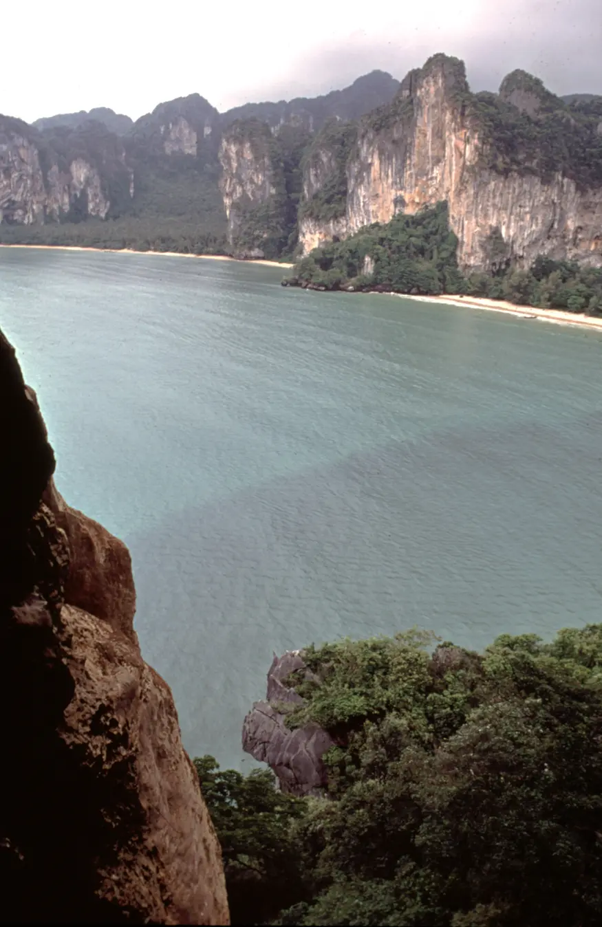 The beautiful seashore in Rai Leh beach, near Krabi, Thailand. This photo was taken from inside a cave near the top of a cliff.