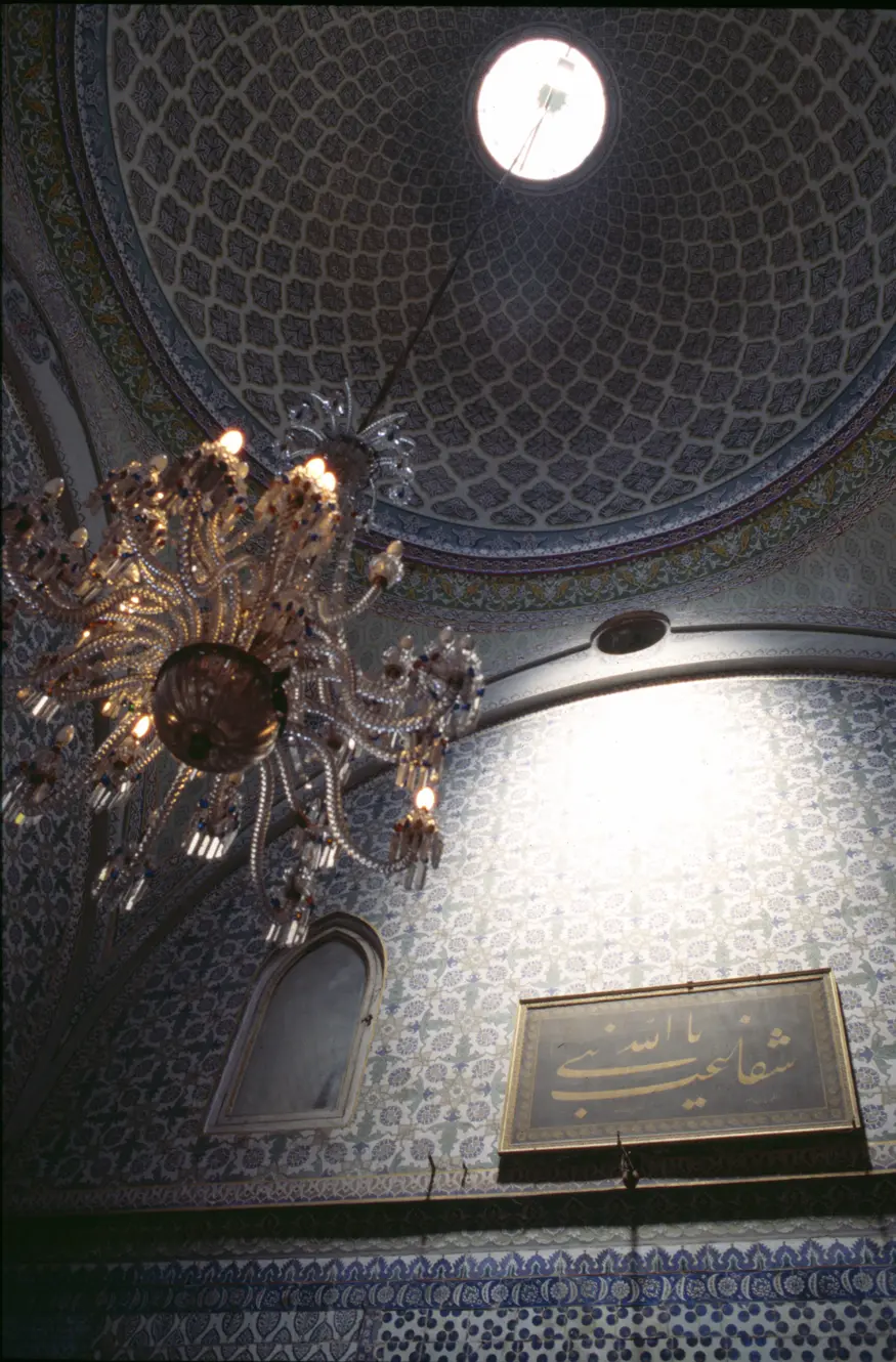 Intricate Turkish tile work and chandelier in Topkapi Palace's Sacred Safe-keeping Rooms. Topkapi Palace was Istanbul's home of the sultans for almost 400 years. The Sacred Safe-keeping Rooms still hold sacred possessions once owned by the Prophet Mohammed.