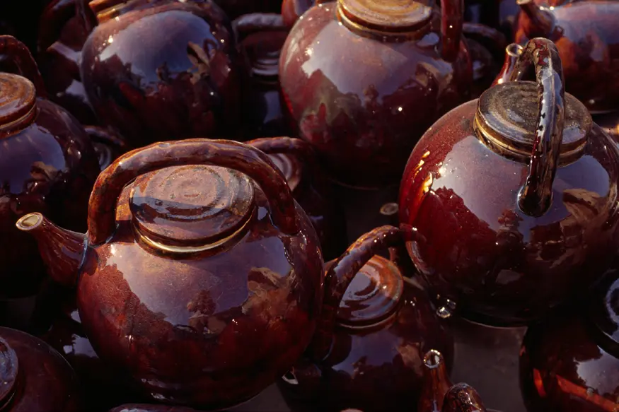 Finished ceramic pots wait to be sold in a pottery factory located on the way to Halong Bay.