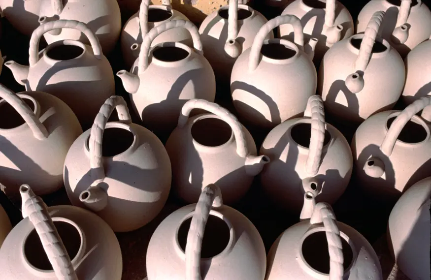 Unfinished ceramic pots wait to be fired in a store somewhere between Halong Bay and Hanoi.